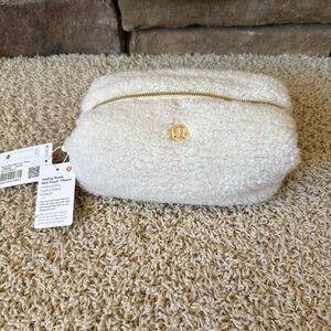 NWT!!  Lululemon Feeling Ready Ivory White Fleece Mini Pouch with Gold Accents